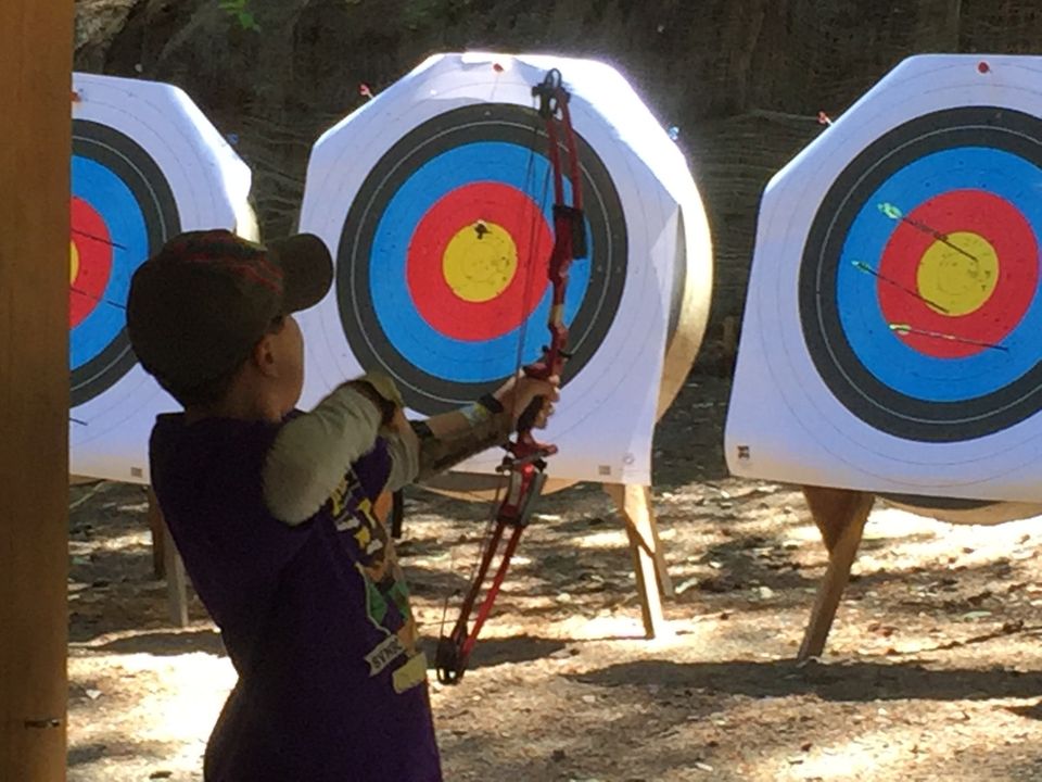 Archery on the range at summer camp
