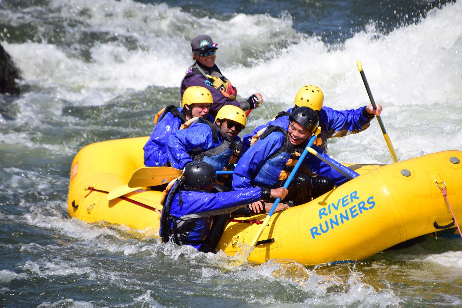 Running the whitewater on the spring rafting trip
