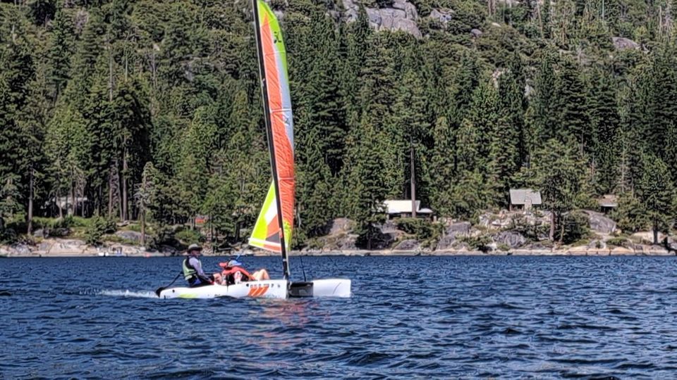 Sailing on the lake at summer camp