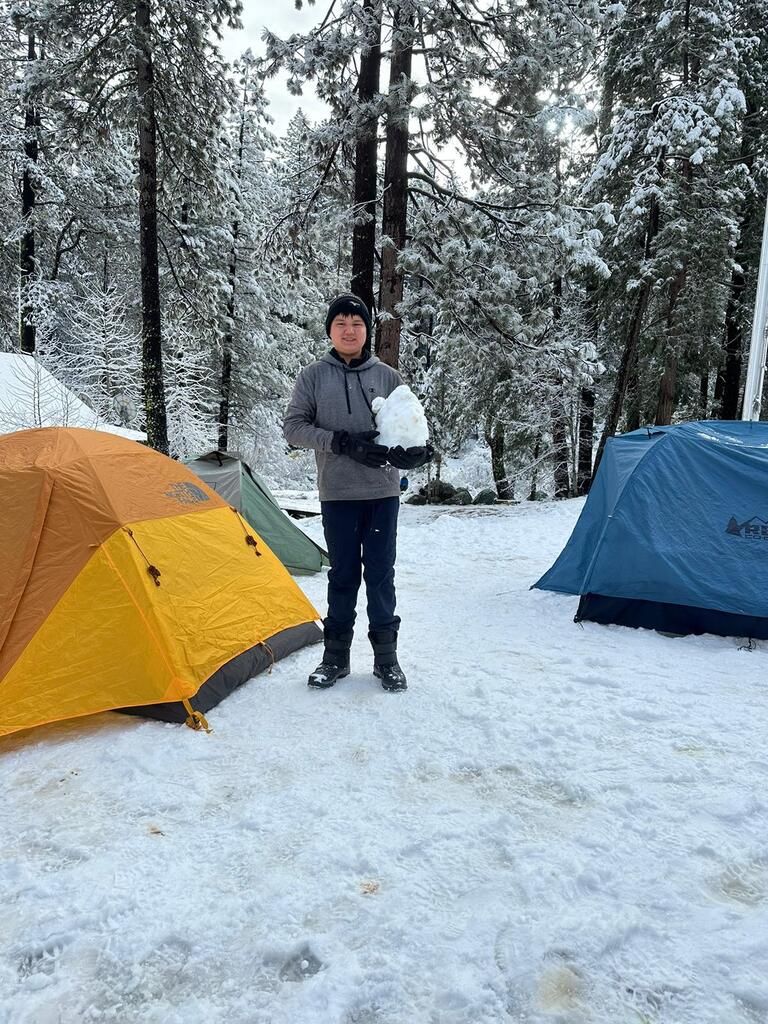 Tents pitched in fresh snow on the winter campout